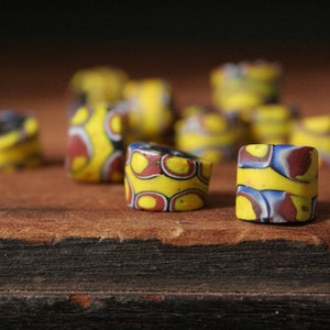 Antique Venetian glass, African trade beads, 12 antique glass beads