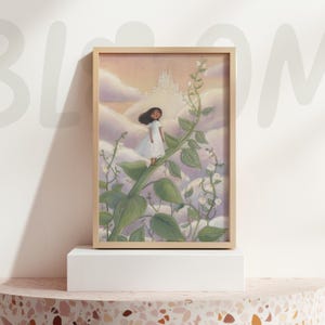 May include: A framed art print showing a young girl in a white dress on a giant beanstalk. The artwork uses a soft palette of pink, green, and white, with a castle in the clouds. The print is displayed on a white plinth.