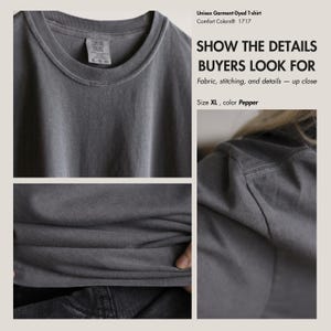 以下が含まれることがあります： グレーのユニセックスガーメントダイTシャツのクローズアップ。生地の質感、ステッチ、および「XL-79-50」と書かれたタグが含まれています。シャツはComfort Colors® 1717、サイズXL、カラーペッパーです。