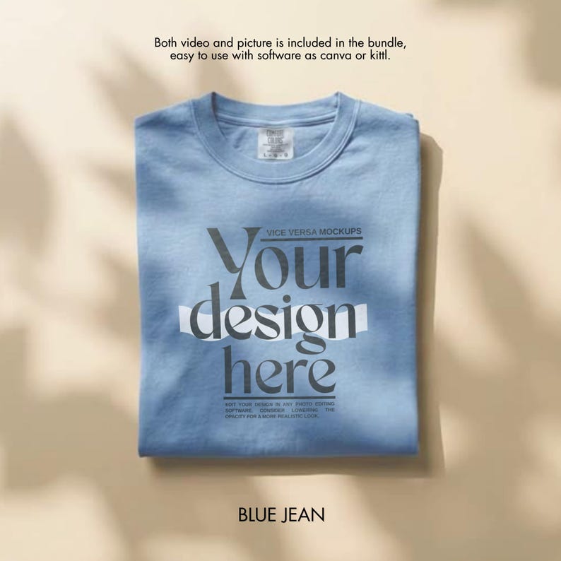 May include: A folded blue jean t-shirt with the text "Your design here" in a stylized font. The shirt also has the text "VICE VERSA MOCKUPS" and "BLUE JEAN". The shirt is on a light brown surface.