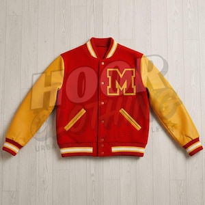May include: A red and yellow varsity jacket featuring the letter "M". The jacket has yellow sleeves, a red body, and white and yellow striped cuffs and collar. It is buttoned up and has two front pockets.