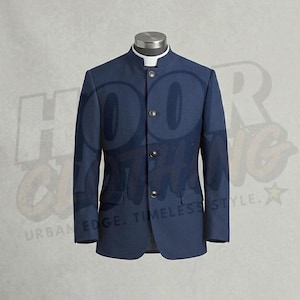 May include: A navy blue blazer with a mandarin collar and three dark buttons. The blazer has a white collar and two front pockets. The jacket is displayed on a mannequin.