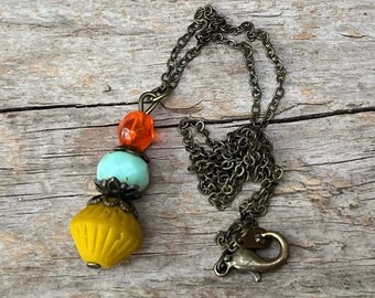 Vintage necklace with pendant made of Bohemian glass beads - mustard, ochre, turquoise, orange & bronze