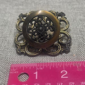 Vintage set med 13 filigran lådknoppar och tallrikar