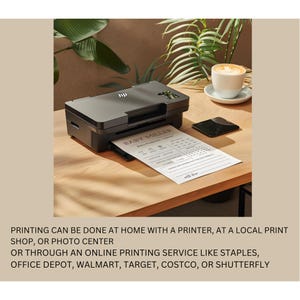 May include: A black HP printer printing a "Baby Miller" document on a wooden desk. A cup of coffee and a smartphone are also on the desk. The text on the document is clear and readable.