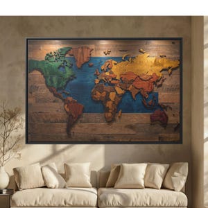 May include: A framed wooden world map with a black border. The continents are crafted from various wood tones and colors, set against a blue ocean backdrop. The map is mounted on a wooden plank background.