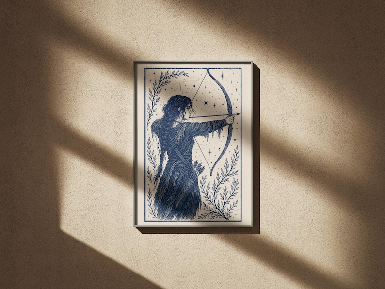 May include: Framed art print featuring a detailed illustration of a figure aiming a bow and arrow. The artwork is rendered in shades of blue and white, with a celestial background and botanical elements. The archer is depicted in a flowing gown.