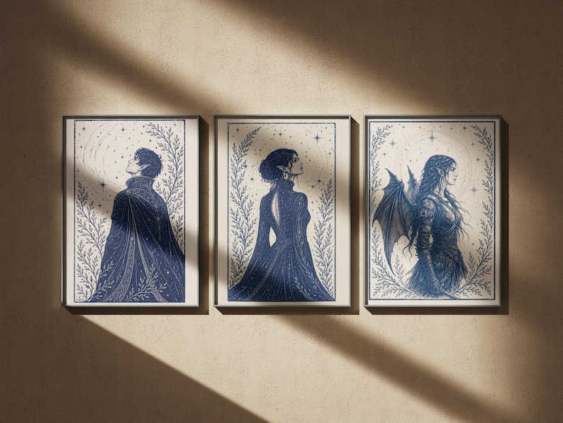 May include: Three framed art prints featuring celestial-themed illustrations in navy blue. Each print showcases a figure in profile, surrounded by botanical elements and stars. The artwork has a vintage aesthetic.