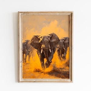 May include: A framed painting showing a herd of elephants running through a dusty, golden landscape. The artwork features detailed depictions of the elephants with visible tusks and textured skin, set against a warm, atmospheric background.