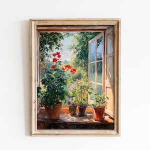 May include: A framed painting depicts a sunlit outdoor scene viewed through an open window. Potted plants with red flowers and green foliage sit on the windowsill. The window reveals a lush garden with trees and a bright sky.