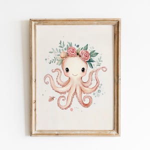 May include: Watercolor illustration of a charming octopus wearing a floral crown, framed in a rustic wooden frame. The octopus is a soft pink color with delicate details, and the crown features pink roses and green leaves. A whimsical art print.