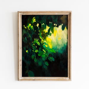 May include: An oil painting in a wooden frame depicts a verdant forest scene. Bright yellow light filters through the leaves, creating a contrast with the dark green foliage. The artwork is mounted on a white wall.