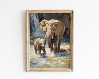 May include: Framed artwork depicting an adult elephant and a calf walking through a river. The painting features a waterfall in the background and is set in a natural, outdoor environment. The frame is a light brown color.