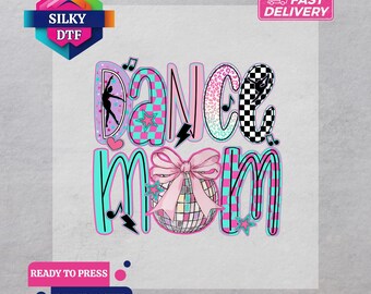 May include: A DTF transfer featuring the words "DANCE MOM" in a colorful, playful design. The word "DANCE" has a checkered pattern, a silhouette of a dancer, and musical notes. The word "MOM" has a disco ball and bow.