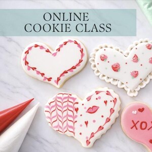 May include: Heart-shaped cookies decorated with various designs, including floral patterns, lip prints, and the text "XOXO." The image also shows piping bags and the text "ONLINE COOKIE CLASS."