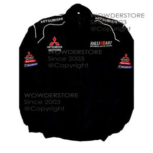 May include: Black jacket with white accents and multiple logos, including "Mitsubishi Motors" and "Ralliart." The jacket features the text "WOWDERSTORE Since 2003 @Copyright."