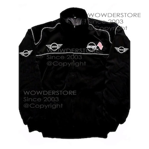May include: Black zip-up jacket with white trim and multiple MINI logos. The jacket features the text "WOWDERSTORE Since 2003 @Copyright" and a checkered flag design. A sporty, casual jacket.