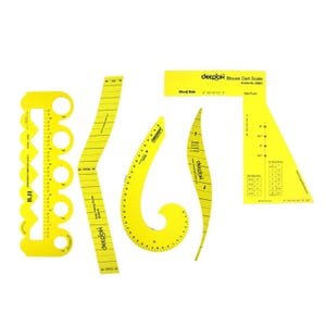May include: A collection of yellow sewing tools, including rulers and curves, with black markings and text. The tools, including a blouse dart scale, are branded "deepak". These tools are used for pattern making and garment construction.