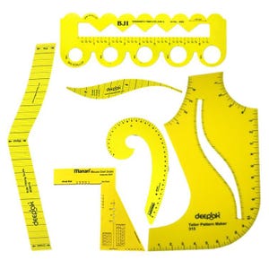 May include: A selection of bright yellow sewing pattern templates and rulers. The set includes various shapes and sizes, such as curved rulers, straight edges, and a scalloped edge ruler. The text "deepak" and "Manan Blouse Dart Scale" are visible.