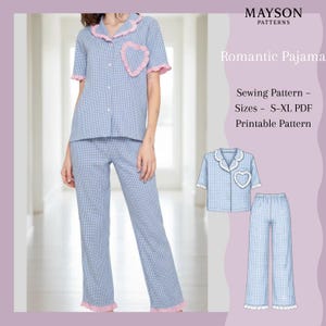 May include: Blue and white gingham pajama set with pink ruffle trim. The top has a heart-shaped applique and a collar. The image also includes a smaller illustration of the pajama set and the text "Romantic Pajama" and "Sewing Pattern - Sizes S-XL PDF Printable Pattern".
