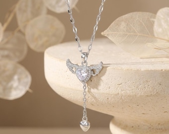 Collana con ciondolo a forma di cuore alato in acciaio inossidabile