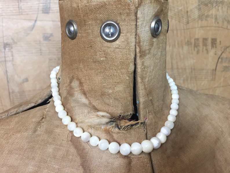 Circa 1950s The White Cats Eye Glass Bead Necklace Wonderful Light Catching Marbling
