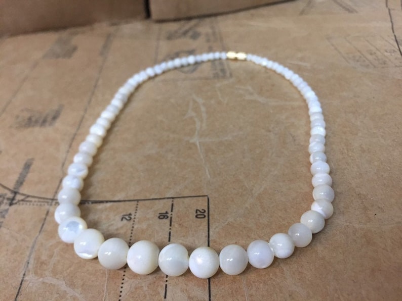 Circa 1950s The White Cats Eye Glass Bead Necklace Wonderful Light Catching Marbling