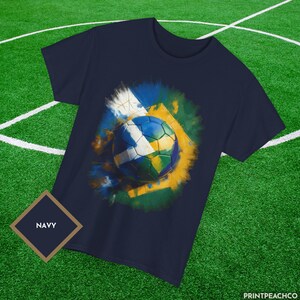 Scotland vs Brazil Navy Blue Graffiti style design t shirt on a football pitch.