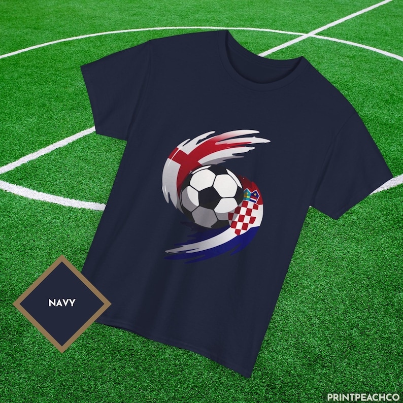 Navy England vs Croatia football fan shirt with bold flag swirl soccer ball design.