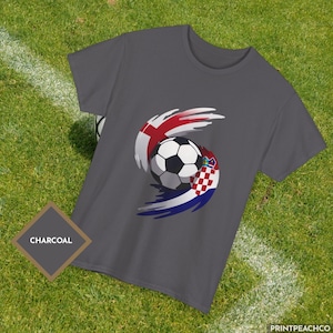 Charcoal England Croatia football t-shirt with bold red white and blue soccer graphic.