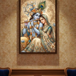 K&ouml;nnte beinhalten: Gerahmtes Kunstwerk, das ein Paar in traditioneller indischer Kleidung zeigt. Der Mann, der Fl&ouml;te spielt, hat blaue Haut und Goldschmuck. Die Frau tr&auml;gt einen blau-wei&szlig;en Sari. Das Kunstwerk weist komplizierte Details und eine Pfauenfeder auf.