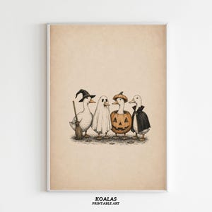 May include: A vertical print featuring four white ducks in Halloween costumes against a beige background. One duck wears a witch hat and holds a broom, one is a ghost, one sits inside a carved pumpkin, and one wears a black vampire cape.