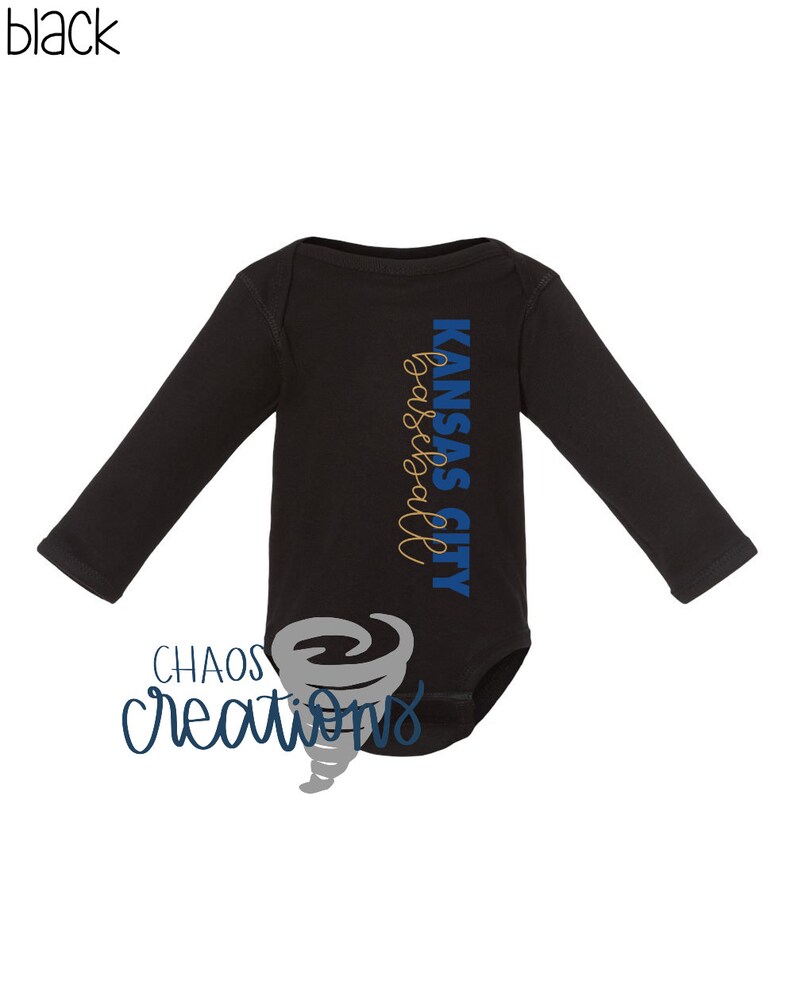 May include: Black long-sleeved baby onesie with the text "Kansas City Basketball" in blue and gold lettering.