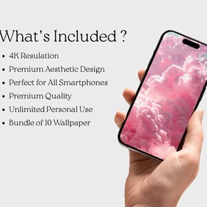 May include: A smartphone with a pink cloud wallpaper is held in a hand. The phone has a black frame and a screen displaying a vibrant pink and white cloudscape. The text "What's Included?" is at the top, with bullet points below.