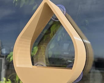 Archivo STL. Comedero para pájaros de ventana con forma de gota de lluvia. Archivo STL
