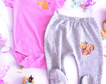 0–3-month pink short sleeve bodysuit and gray footie pants with squirrel applique