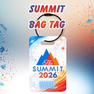May include: A white bag tag with the text "SUMMIT BAG TAG" above it. The tag features a mountain graphic and the words "The SUMMIT 2026 NAME" in blue, orange, and red. It has a black loop for attachment.