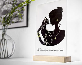 Letrero acrílico con silueta de mujer con gato