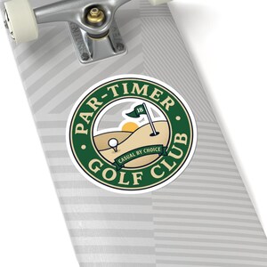 May include: A set of three ceramic mugs with a speckled, cream-colored glaze. Each mug features a different hand-painted design: a blue and green leaf, a yellow flower, and a red berry. The mugs have a simple, rounded shape.