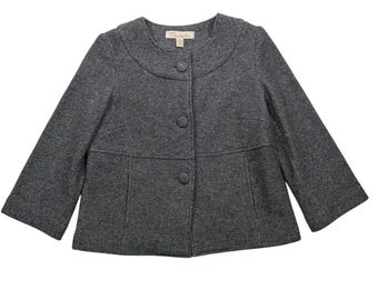 Chaqueta estilo swing vintage Y2K de Mainbocher, color gris medio, lana metalizada, manga tres cuartos.