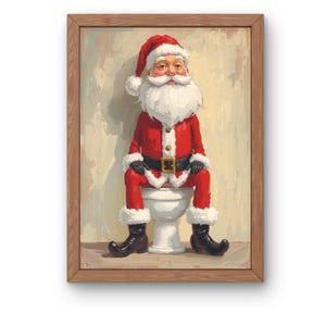 May include: A framed painting depicts Santa Claus in his traditional red suit and hat, seated on a white toilet. The artwork has a humorous theme, with Santa's black boots and white beard visible.