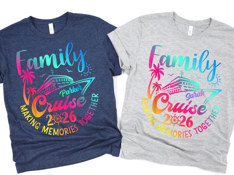 May include: Two t-shirts, one navy blue and one grey, with a colourful graphic. The graphic includes the word "Family" and "Cruise 2026" with a cruise ship, palm trees, and the text "Making Memories Together."