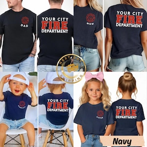 May include: Navy blue t-shirts with red and white text and graphics. Designs include "DAD", "MOM", and "SISTER", along with "YOUR CITY FIRE DEPARTMENT". The shirts are available in navy.
