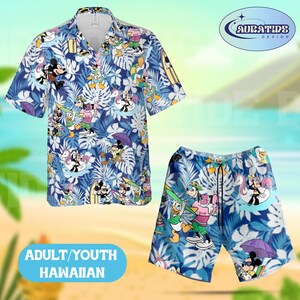 May include: Blue Hawaiian shirt and shorts set with a tropical leaf pattern and cartoon characters. The set includes a short-sleeved button-down shirt and matching shorts. The text "ADULT/YOUTH HAWAIIAN" is visible.