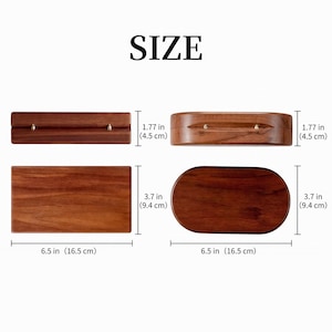 May include: Wooden box with dimensions displayed. The box is 6.5 inches (16.5 cm) long, 3.7 inches (9.4 cm) wide, and 1.77 inches (4.5 cm) high. The box is rectangular and oval-shaped.