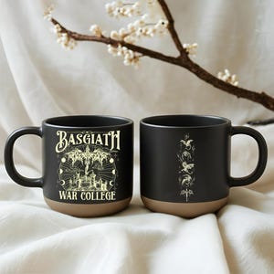 May include: A set of three ceramic mugs with a speckled, matte finish. The mugs are in shades of cream, light gray, and dark gray. Each mug has a simple, minimalist design, perfect for coffee or tea.