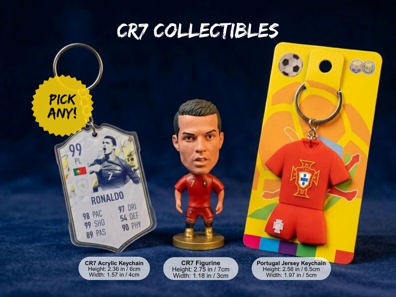 May include: Collection of CR7 collectibles, including an acrylic keychain with a player card design, a figurine, and a Portugal jersey keychain. The figurine is 2.75 inches tall. The acrylic keychain is 2.36 inches tall. The jersey keychain is 2.56 inches tall. The text "PICK ANY!" is on a yellow sticker.