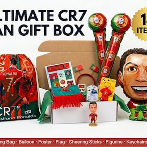 May include: An Ultimate CR7 Fan Gift Box with 14 items, including a drawstring bag, poster, flags, cheering sticks, and a figurine. The box features a large balloon of Cristiano Ronaldo and a variety of fan merchandise.