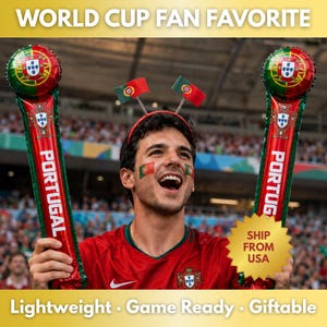 May include: Two inflatable red, green, and gold Portugal fan cheering sticks with the text PORTUGAL printed vertically. The sticks feature the Portugal national coat of arms and flag design, intended for sports events and fan celebrations.