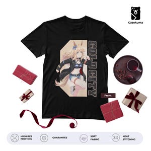 Op de afbeelding: Zwart t-shirt met een kleurrijke anime-stijl illustratie van een personage met blond haar en de tekst "COLD CITY". Het ontwerp bevat een personage in een jas en korte broek. Het shirt is omringd door ingepakte cadeaus.